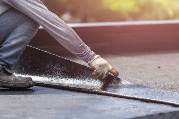 Professional Waterproofing technician working in Roundhead, OH